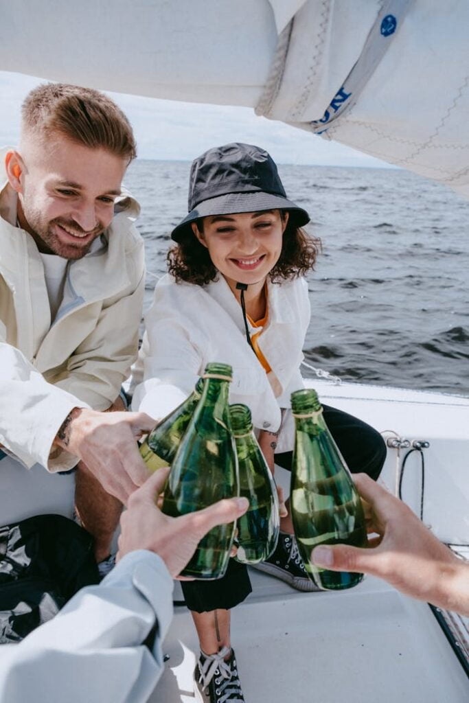 pexels-photo-4910962 Man in White Dress Shirt Holding Green Glass Bottle